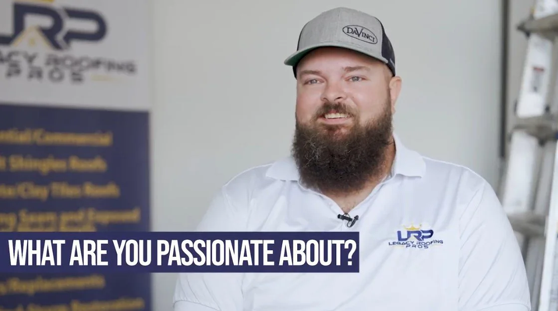 Frame from a JTX Media culture video: a roofing-company employee on camera under the caption “What are you passionate about?”